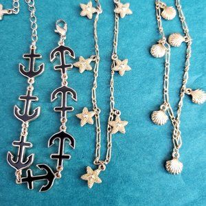 2/10$ Lot of 3 Ocean theme gold tone bracelet